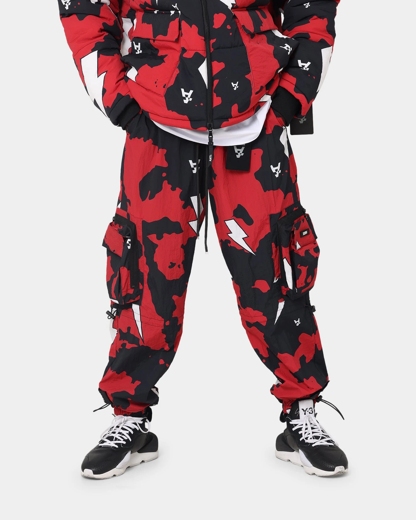 The Anti Order Storm Camo Track Joggers Black/Red/White 1 The Anti Order Storm Camo Track Joggers Black/Red/White